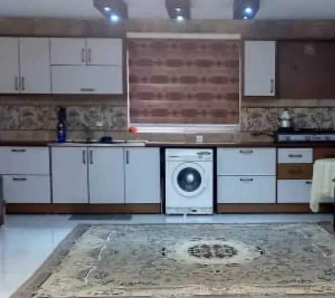 آشپزخانه با کابینت های ام دی اف با لباسشویی ویلا در بابلسر 56848