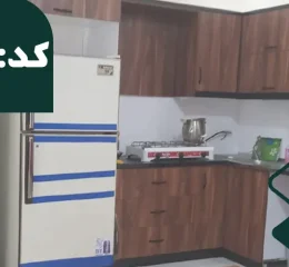 آشپزخانه با کابینت های ام دی اف با یخچال و تلوزیون آپارتمان در بابلسر 156485